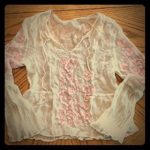 Sheer blouse with appliqués